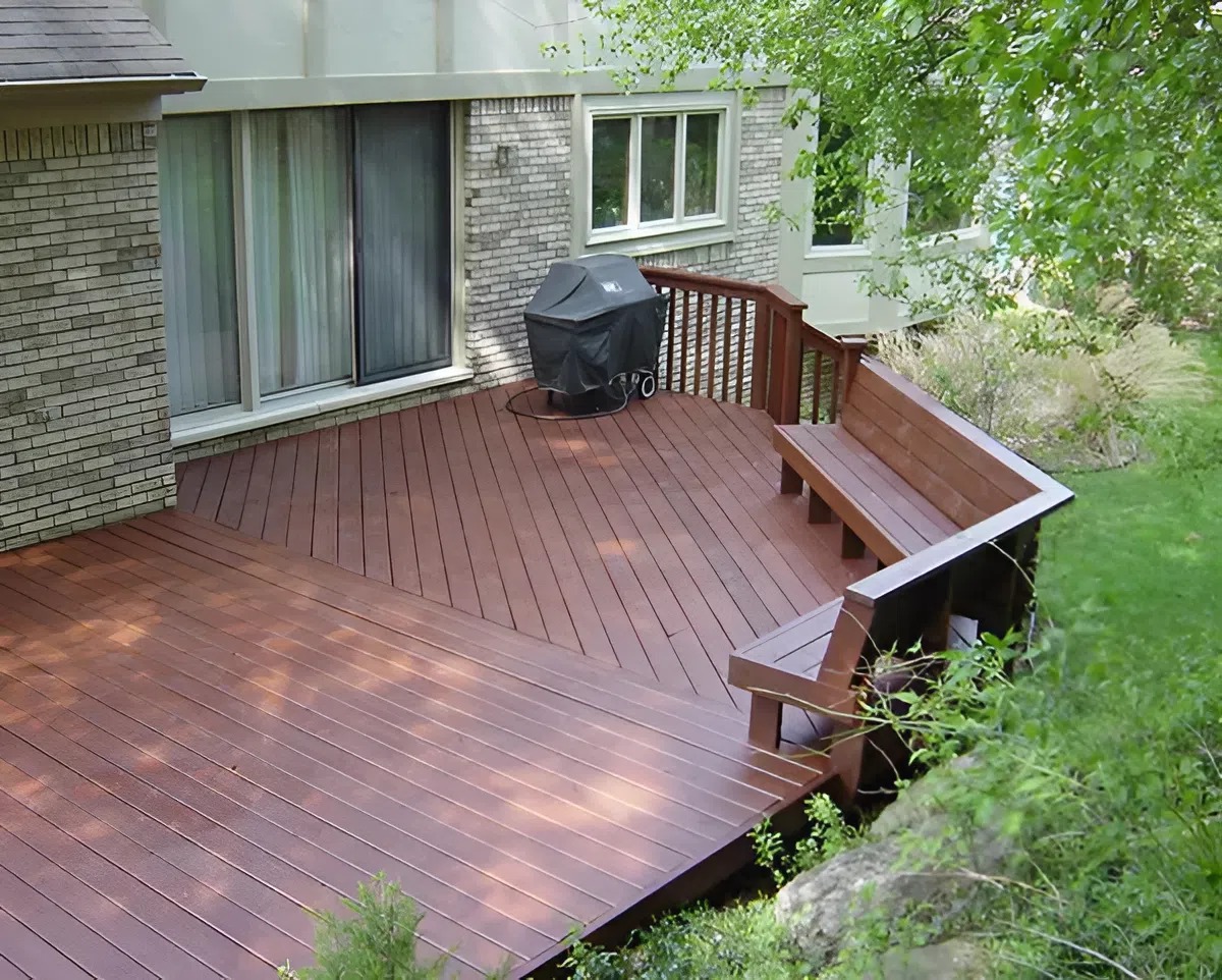 Freshly painted wooden deck with outdoor furniture by a professional house painter in Green Hills, TN
