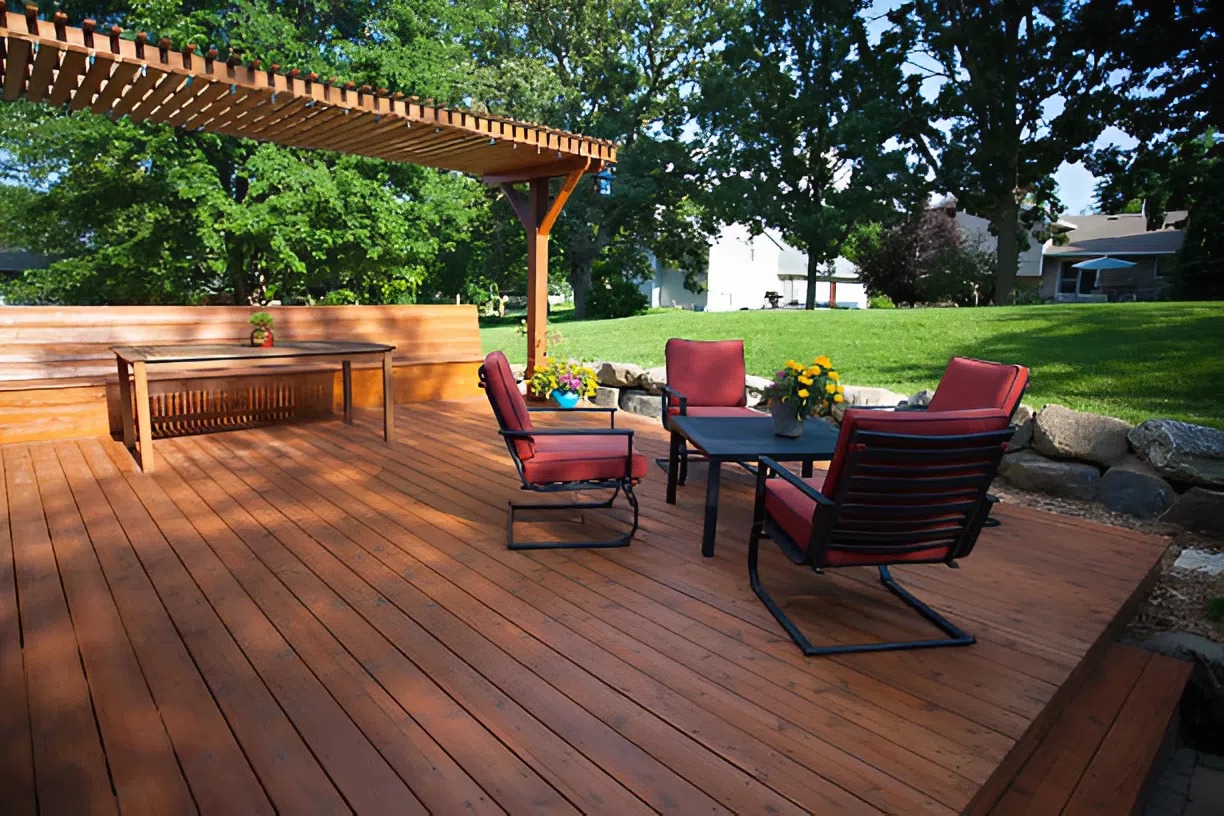 Freshly painted wooden deck with outdoor furniture by a professional house painter in Green Hills, TN