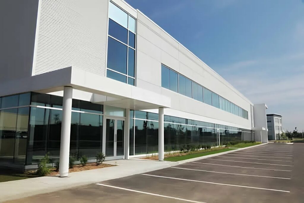 Commercial building exterior freshly painted in neutral tones by an exterior painter in Belle Meade, TN